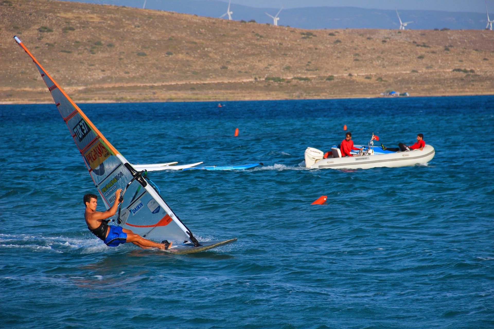 Sina windsurfing off the coast of Alaçatı, Türkiye.